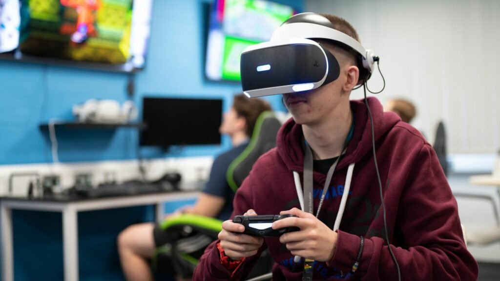 Student using VR headset in gaming lab