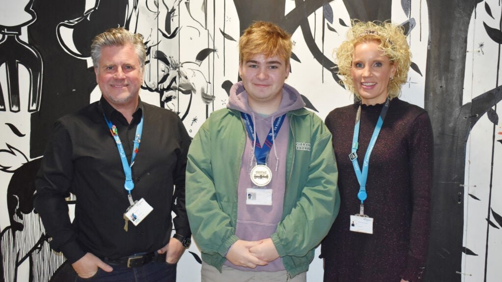 Billy with his Gold Medal from WorldSkills23, next to Programme Director Rob Black and Principal Victoria Copp-Crawley