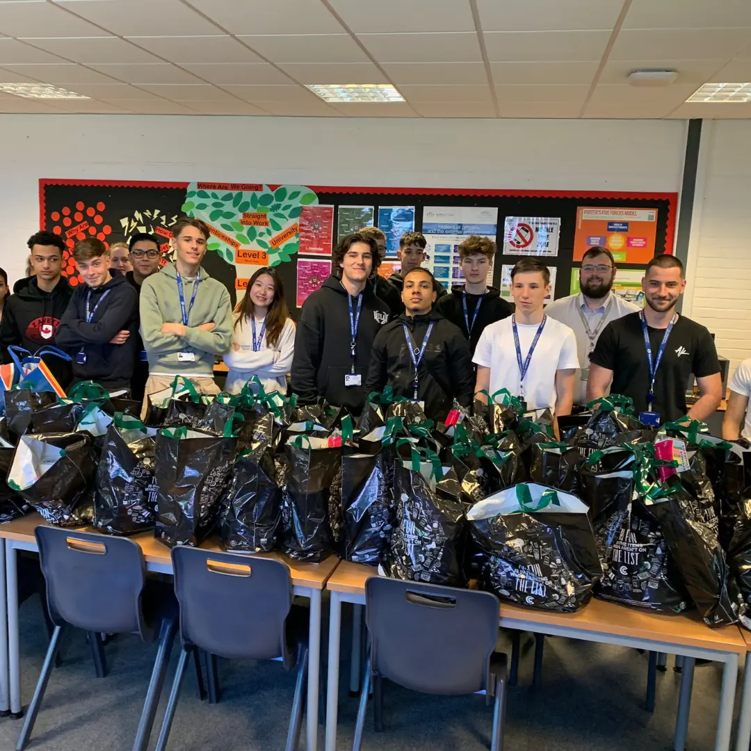 Level 3 Business students with items they've collected for charity